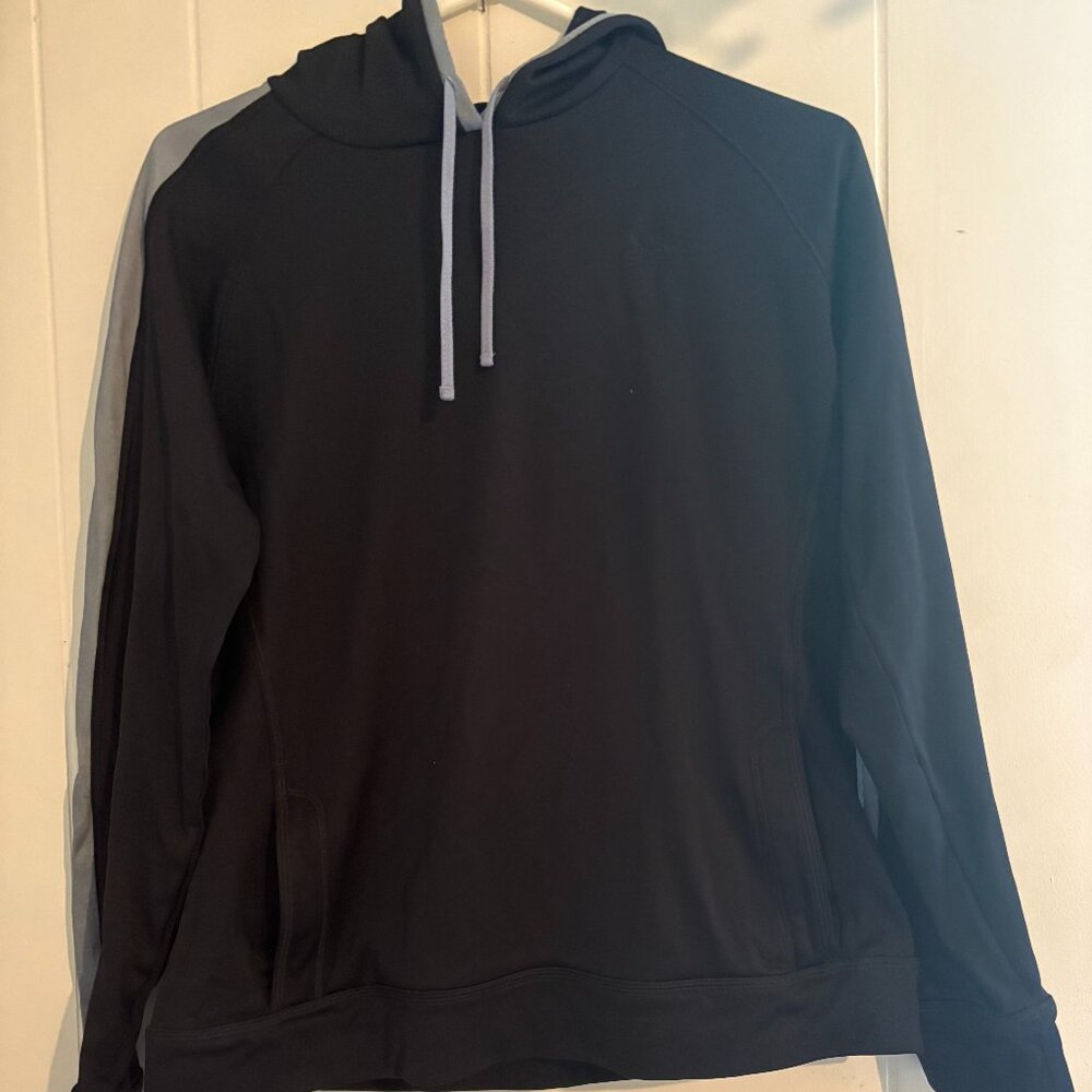 Under Amour Black and Grey Hoodie in a size Medium